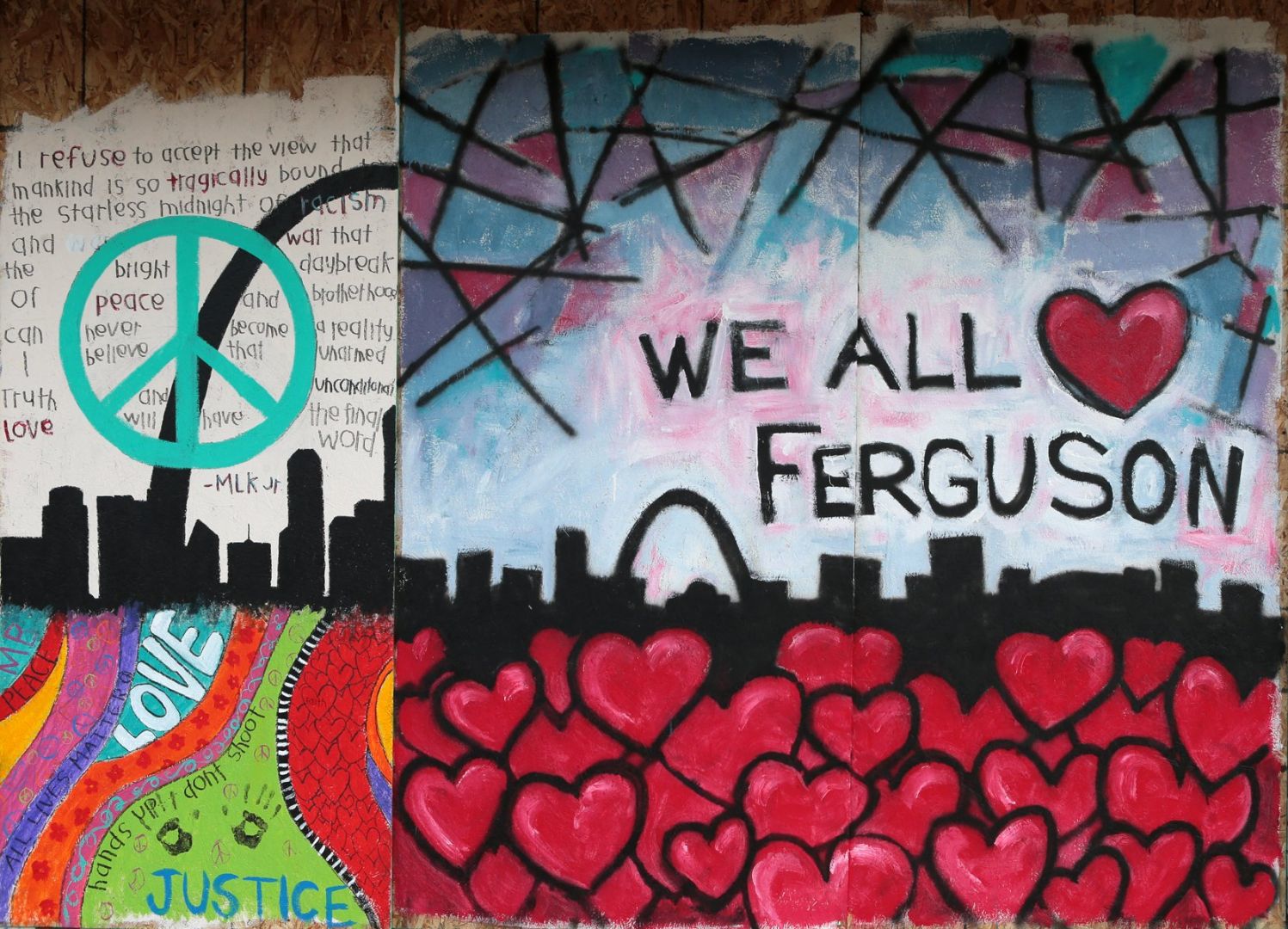 Plywood art protects, transforms Ferguson neighborhood